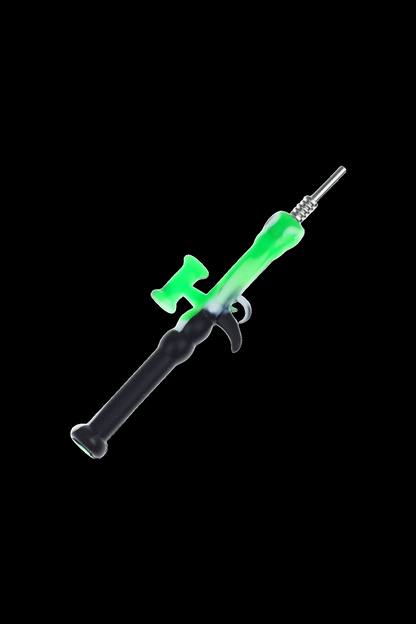 Green and black glass oil rig for cannabis concentrate consumption.