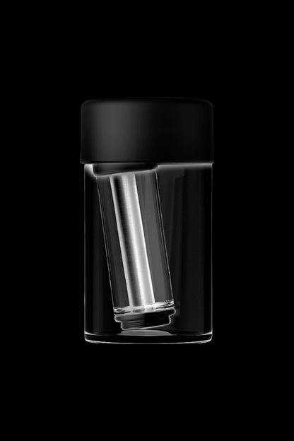 Sleek, clear cannabis jar with a black lid, isolated on a black background.