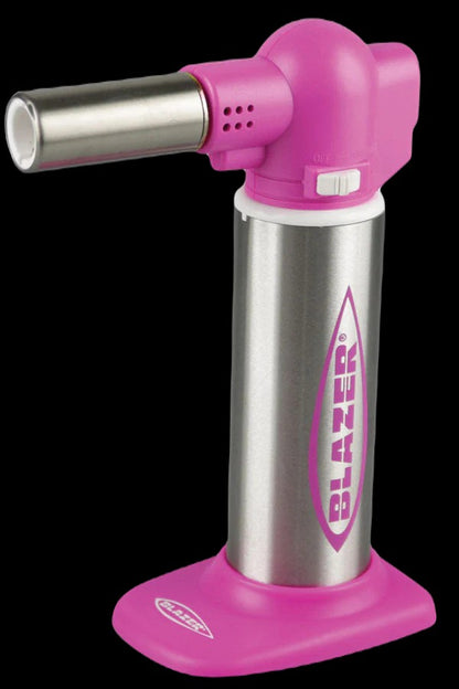 Pink butane torch lighter with silver accents and “Blazer” branding.
