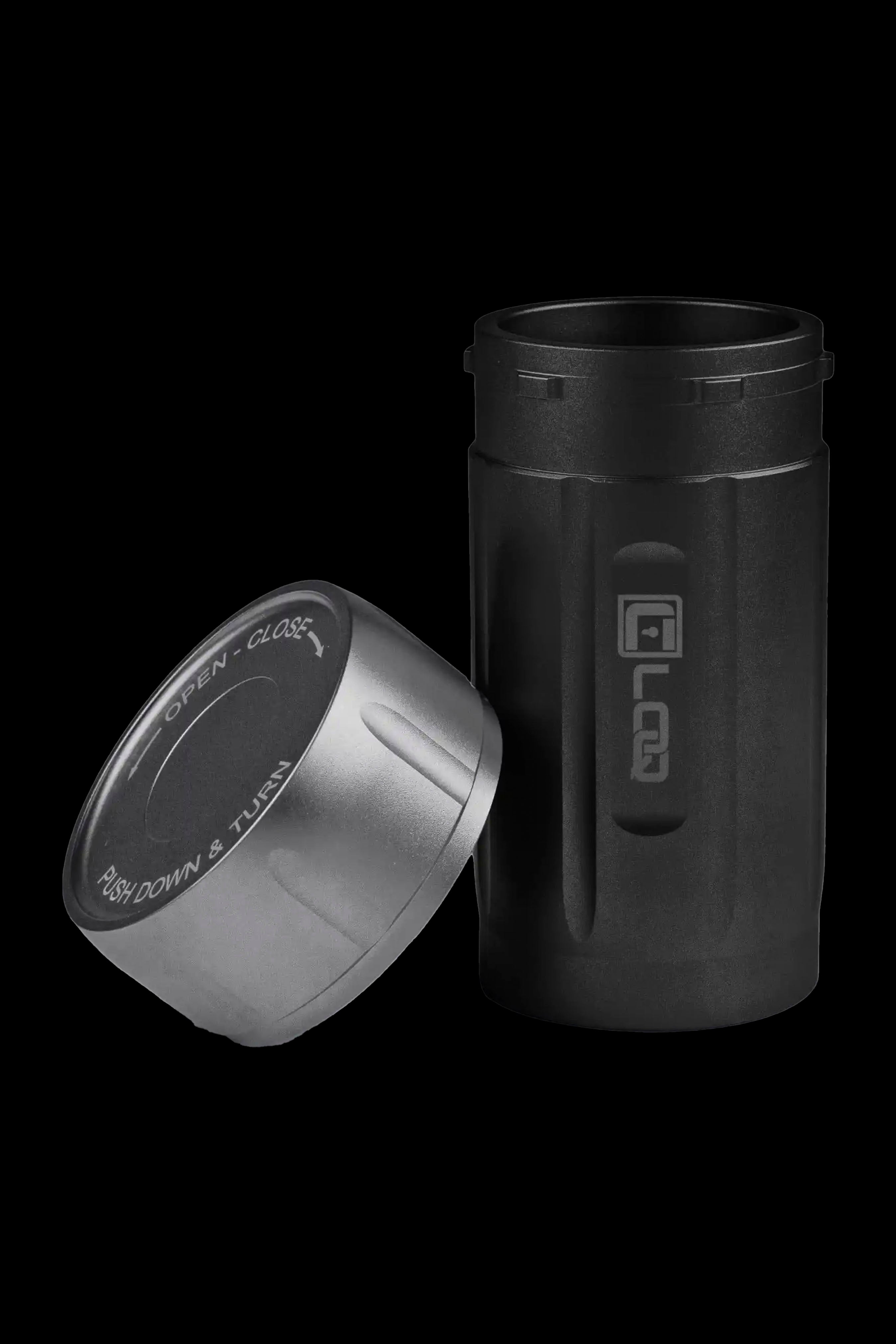 Black cannabis storage container with a child-resistant cap partially unscrewed, displaying “OPEN - CLOSE” and “PUSH DOWN & TURN” instructions.