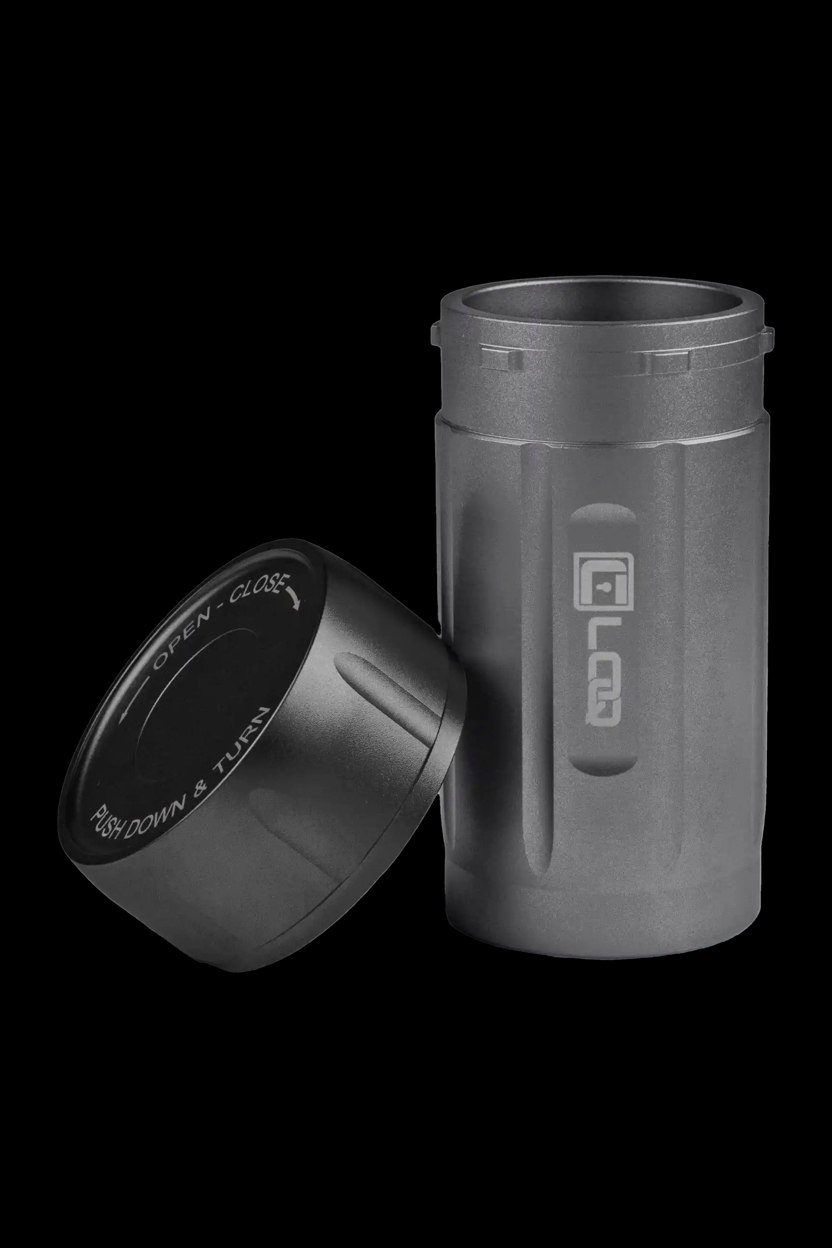 Black PopTop silicone container for cannabis concentrates, with lid partially detached showing "Open - Close" and "Push Down & Turn" instructions.