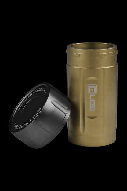 Gold cannabis storage container with a removable cap, labeled "Open - Close" and "Push Down & Turn."