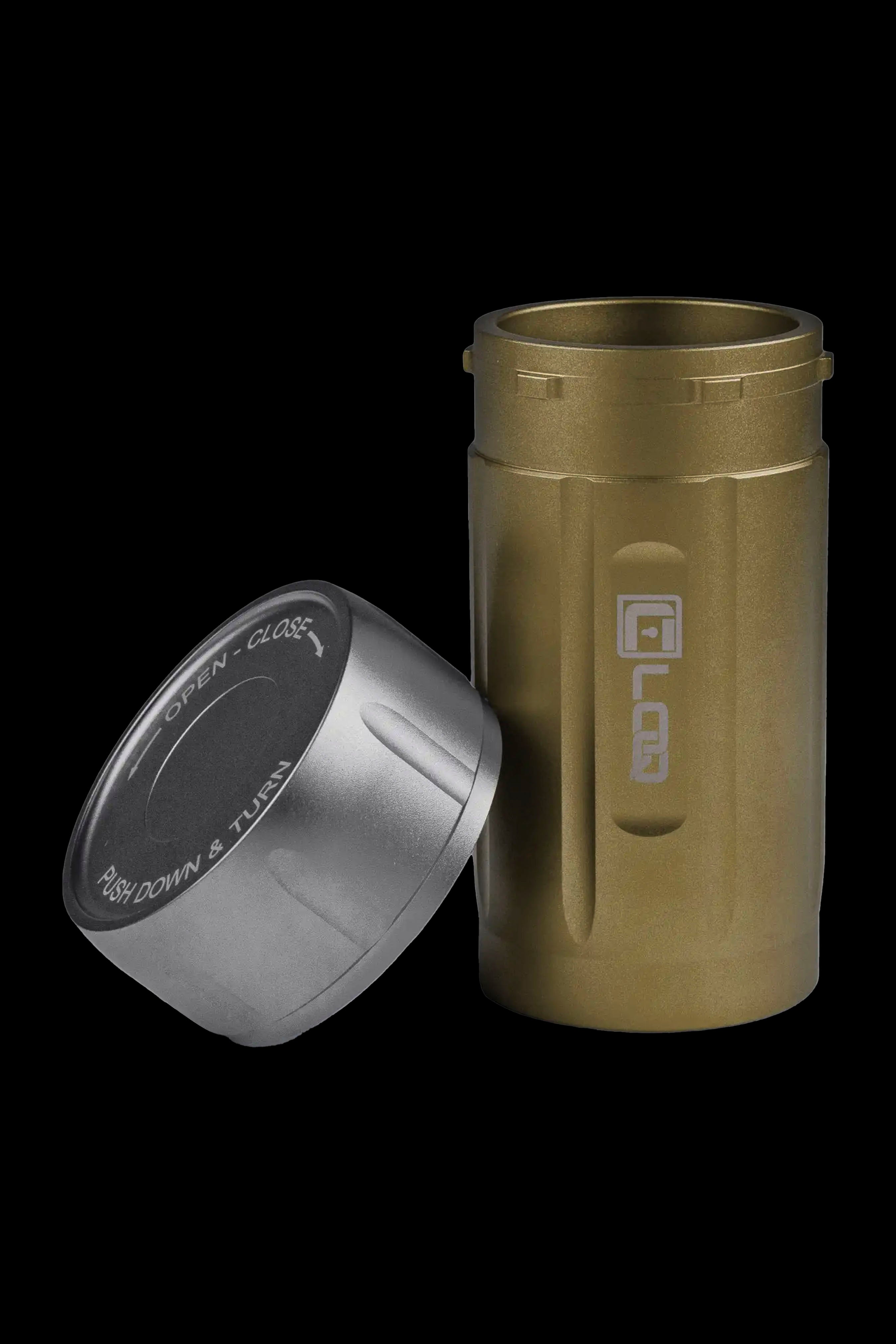 Gold cannabis storage container with open/close lid beside it.
