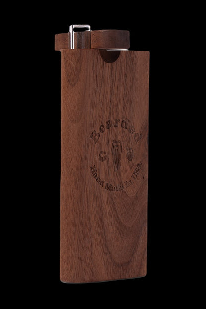 Wooden lighter with engraved cannabis leaf design.
