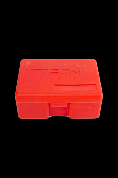 Red cannabis storage box with “TPFM” logo.
