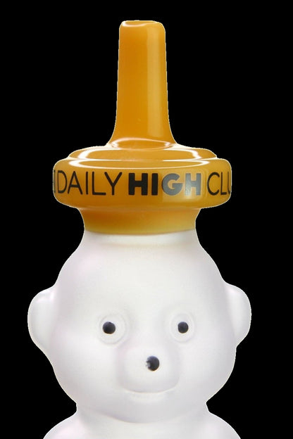 A ceramic water pipe shaped like a nude male torso with “DAILY HIGH CLUB” text.