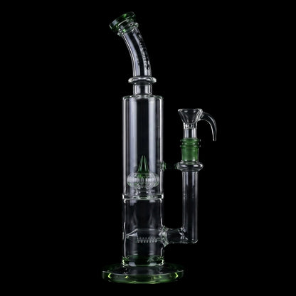 Angled studio shot of the Croia Glass 10" Dual Chamber Scientific Bong with Inline and Rocket Perc showing clear glass and green accents against a black background
