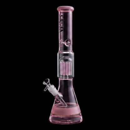 Studio-lit vertical view of the blue Croia Glass 15" Beaker Bong with Tree Perc and Ice Catcher showing pink-tinted glass details.