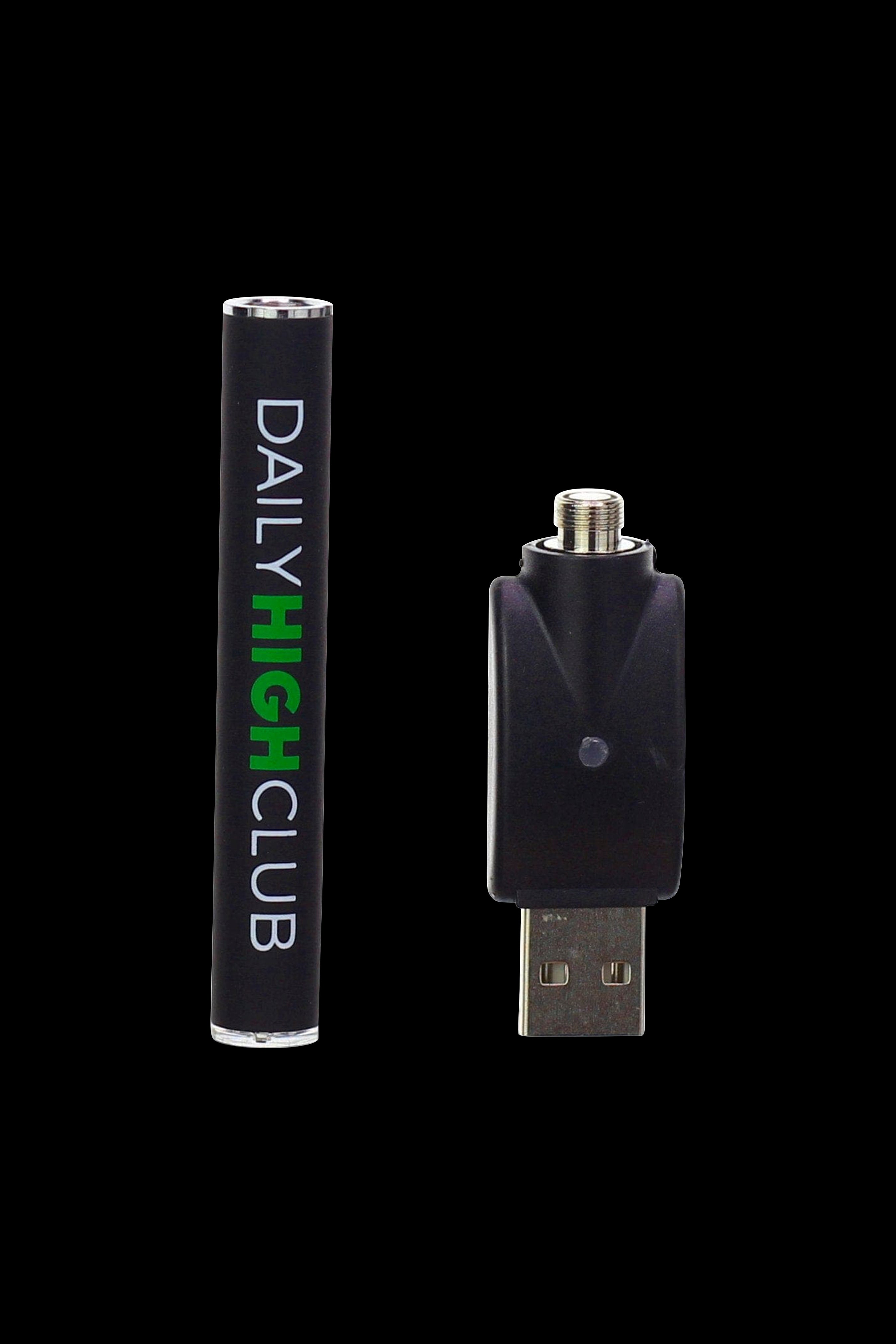 Cannabis vape pen and USB charger on a black background.