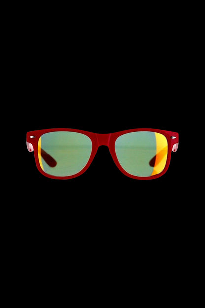 Red-framed sunglasses with iridescent lenses on a black background.