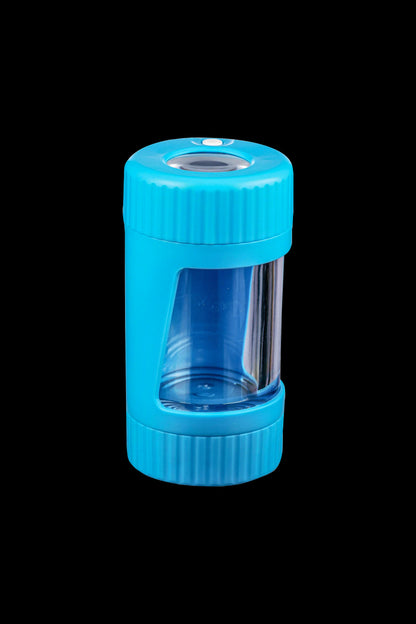 Blue silicone cannabis oil container with a clear glass insert.