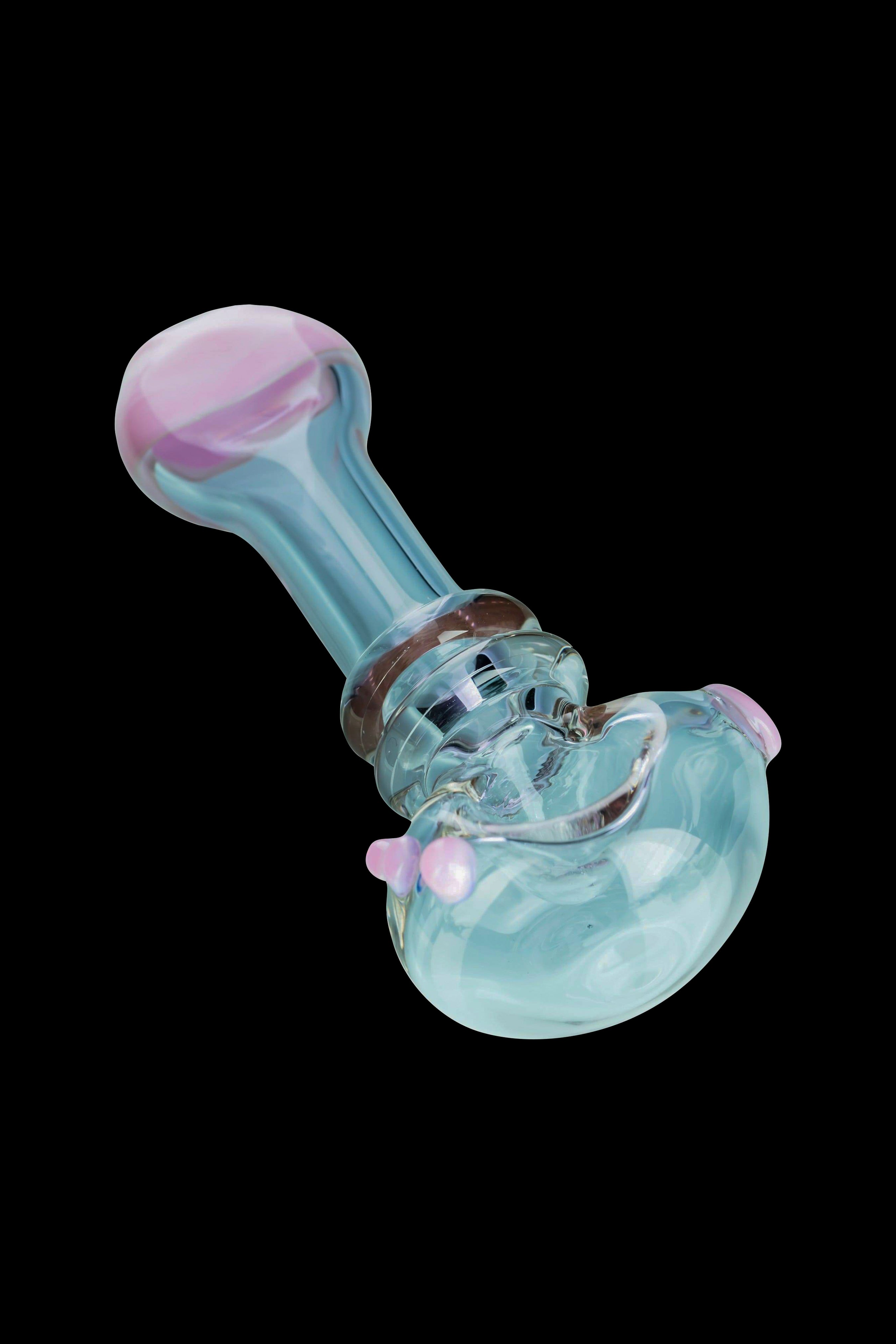Glass cannabis pipe with turquoise and lavender coloring.
