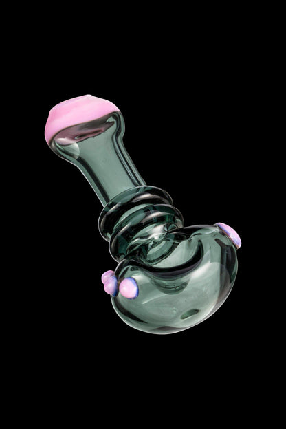 Green glass bubbler with pink accents.