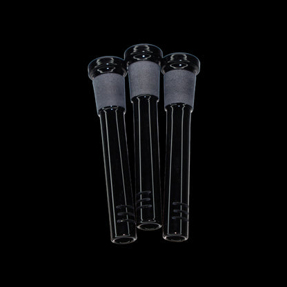 Close-up front view of three black Smoke Cartel Color Diffused Downstem - 3 in. pieces against a solid black background.