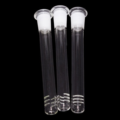 Close-up front view of three Smoke Cartel Color Diffused Downstem - 4.5 in. glass tubes with frosted joints against black.