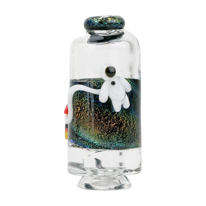 Close-up front view of the Empire Glassworks Puffco Pivot Glass Mouthpiece - Across the Universe showing a clear glass cylinder with a glittering multicolored inner band and a small white astronaut figure.