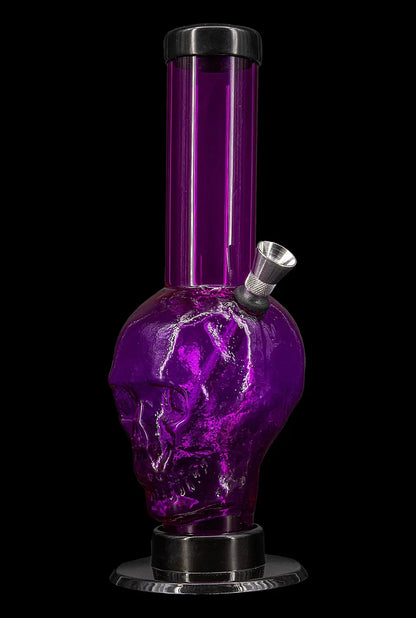 Purple glass water pipe shaped like a skull with chrome accents.