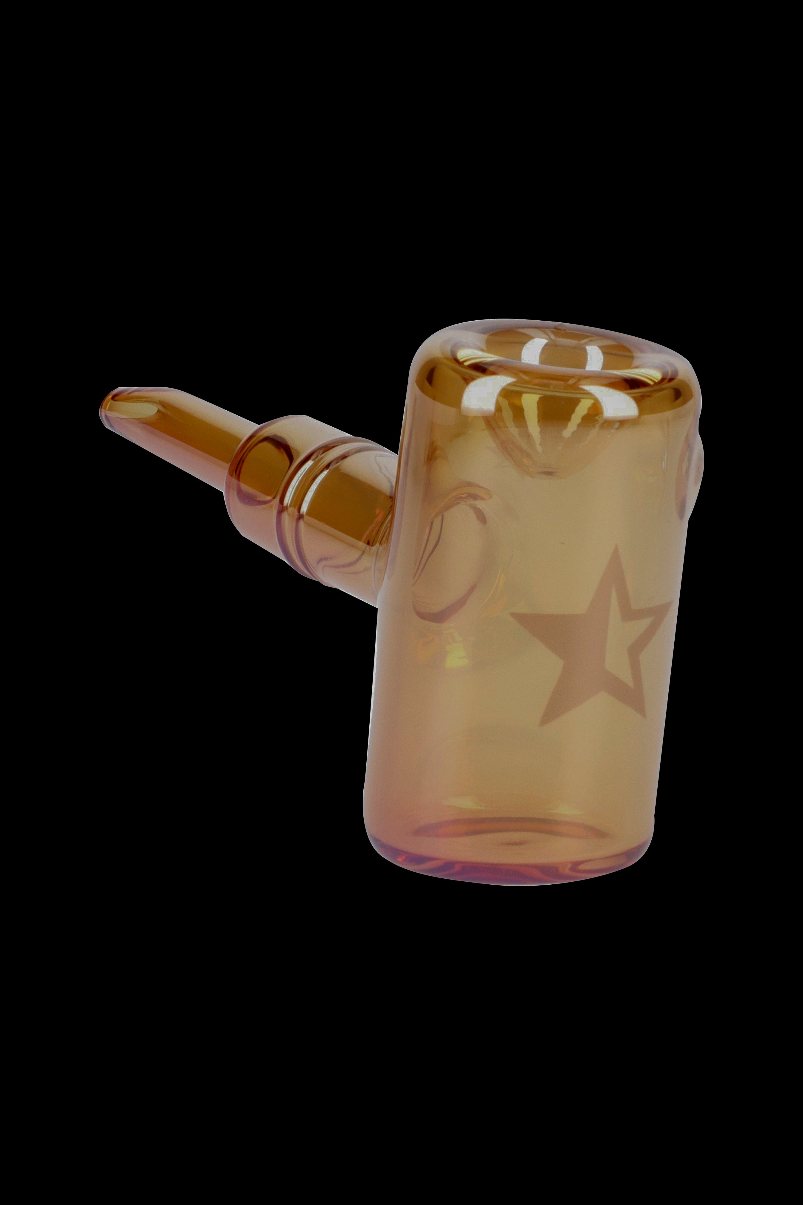 Orange glass bubbler with star designs.