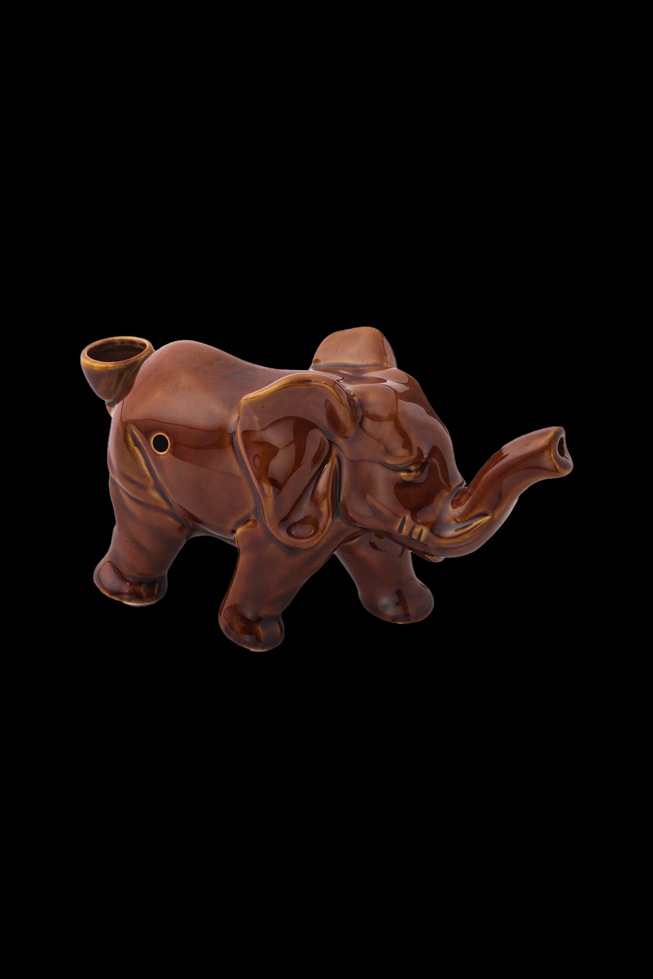 Brown glass elephant-shaped bubbler for smoking.