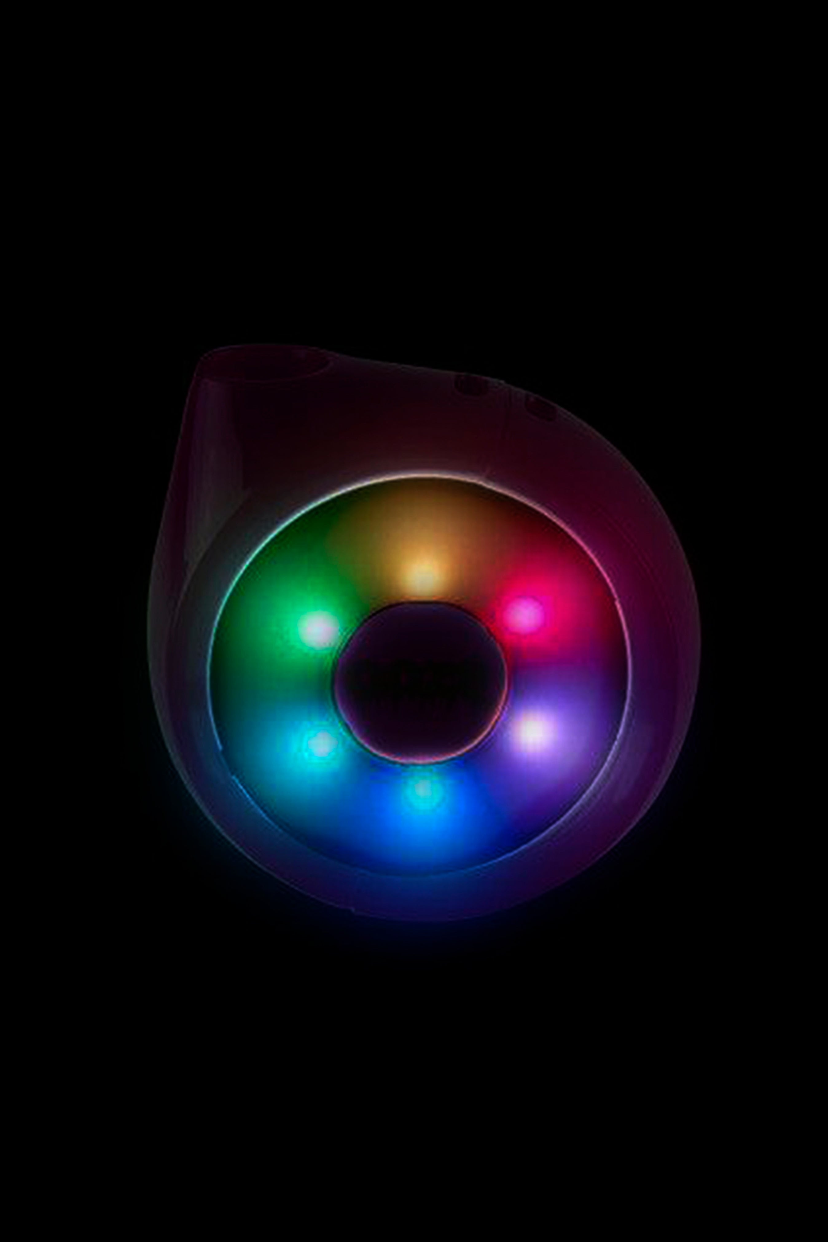 Colorful, illuminated smoking accessory against a black background.