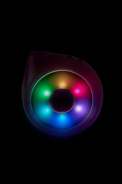 Colorful, illuminated smoking accessory against a black background.