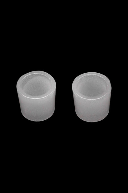 Frosted glass inserts for dab rigs on a black background.
