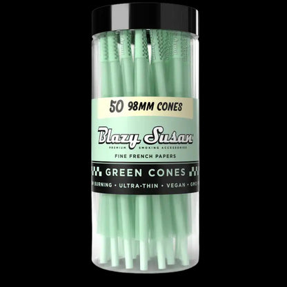 Close-up front view of a clear jar of Blazy Susan Green Cones Jar showing stacked mint-green cones and the labeled mint-and-black band.