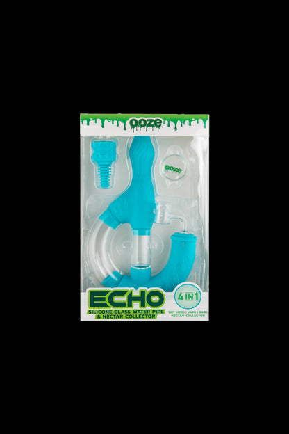 Blue silicone water pipe and nectar collector in retail packaging.