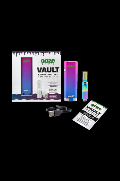 A product shot of an ooze Vault extract battery and storage chamber kit, including the pen, charging cable, and instructions, packaged in a retail box.
