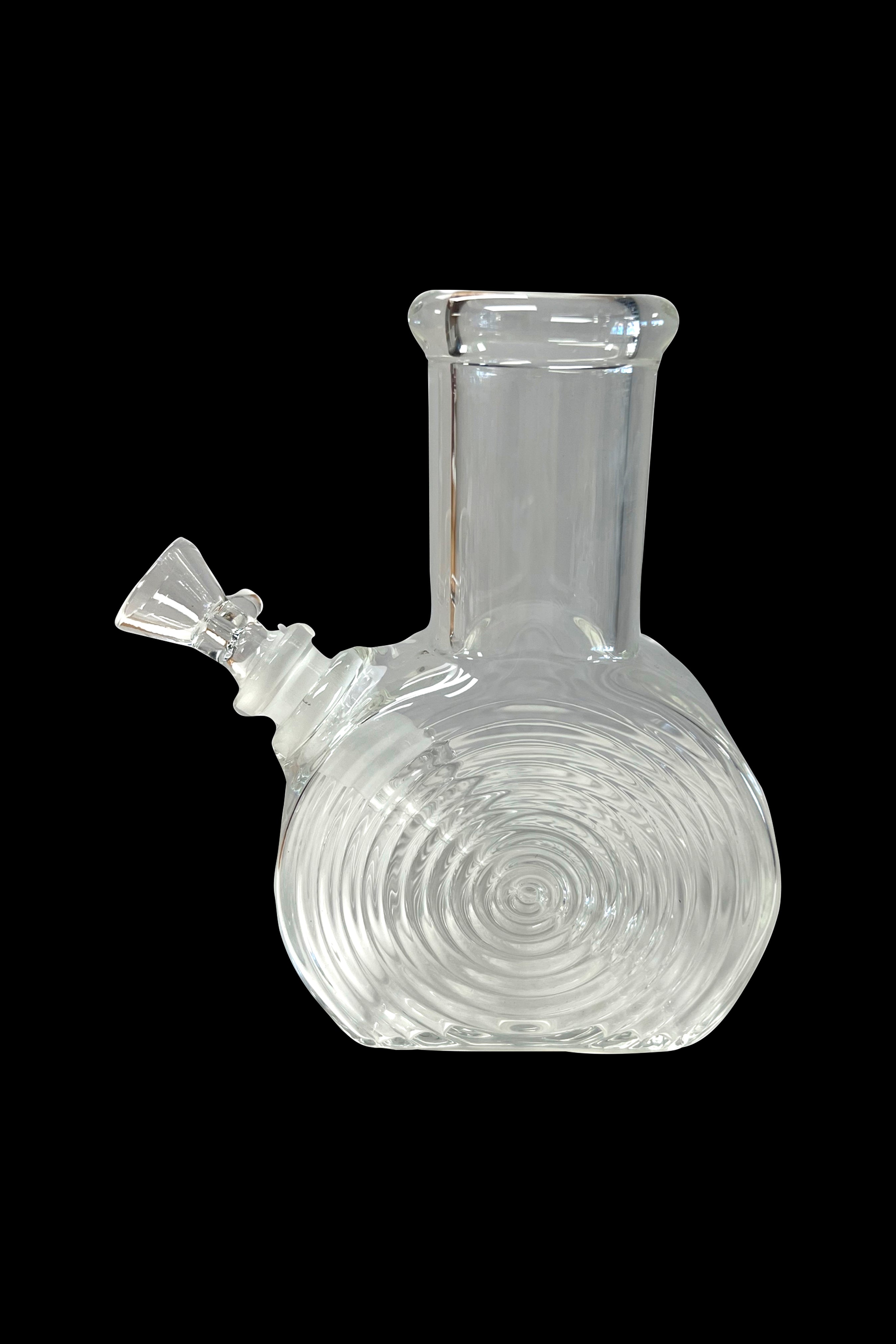Clear glass bubbler water pipe with swirling design against a black background.