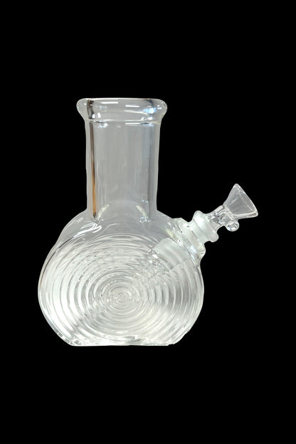 Clear glass bubbler water pipe for smoking cannabis.
