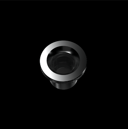 Top-down view of the Boost Evo™ Quartz Atomizer centered on a black background, showing its reflective metal rim and hollow interior.