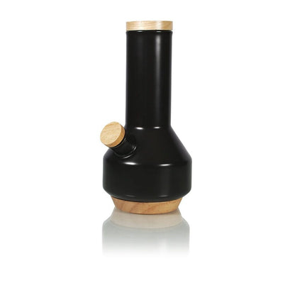 Studio-lit front view of the black RYOT Ceramic Maple Traveller Pipe with light wood accents on the top, mouthpiece, and base.