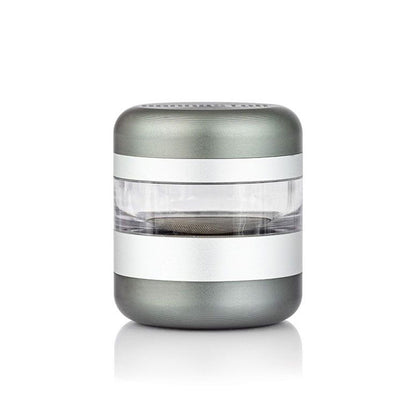 Centered front view of the silver-and-clear RYOT GR8TR Jar Body Grinder with rounded top and bottom against a white background