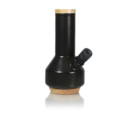 Front view of the RYOT Ceramic Maple Traveller Pipe showing a matte black ceramic body with angled mouthpiece and light wood accents at top and base.