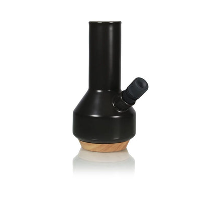 Front view of the RYOT Ceramic Maple Traveller Pipe showing a matte black ceramic body with a side mouthpiece and a visible maple wood base.