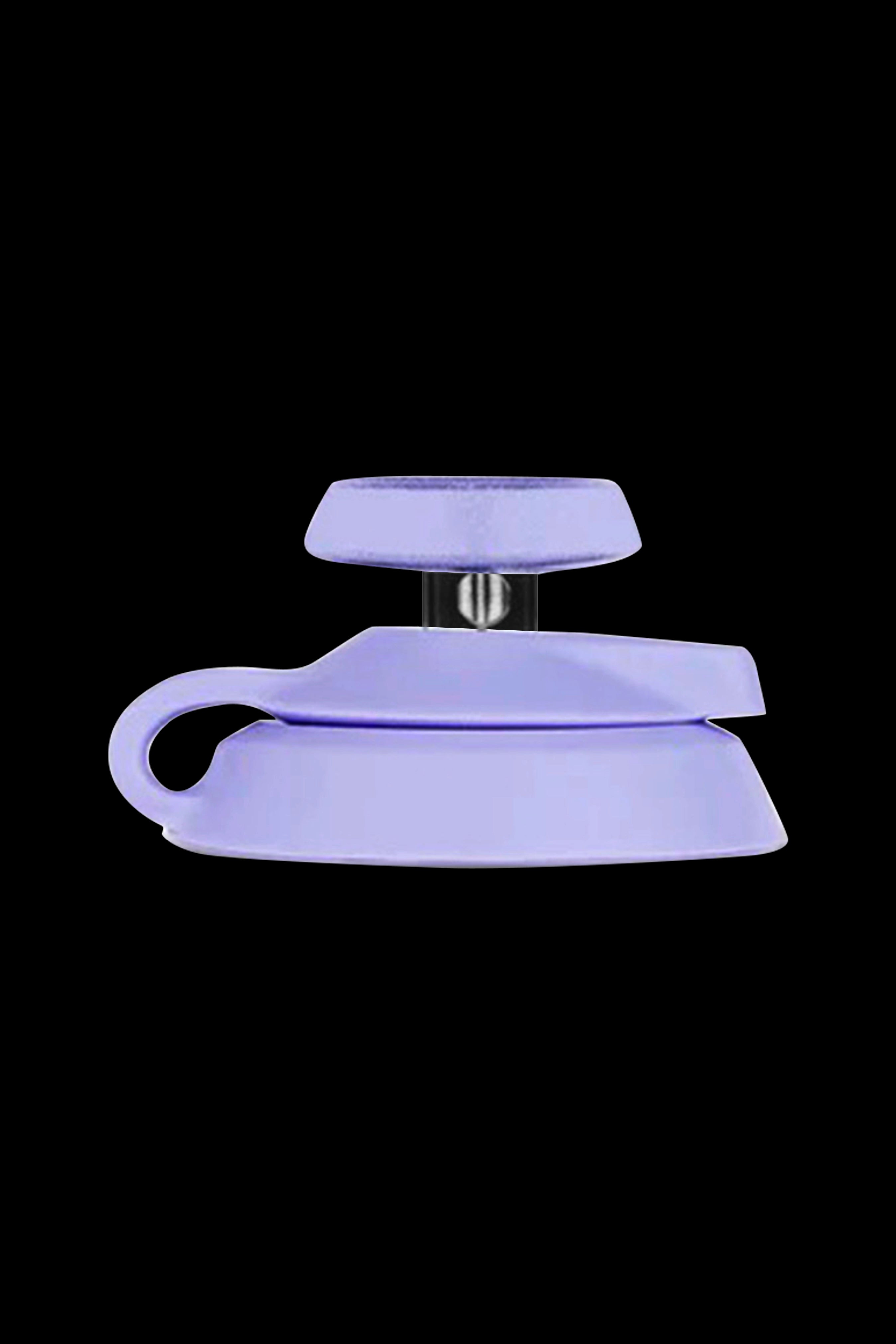 Lavender silicone carb cap for dabbing cannabis concentrates.