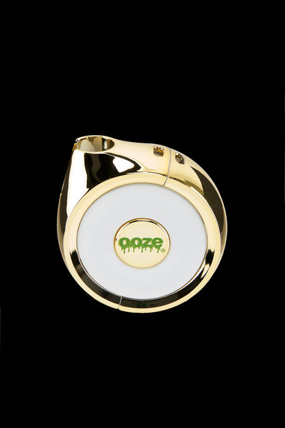 Gold cannabis vaporizer pen with “ooze” logo.