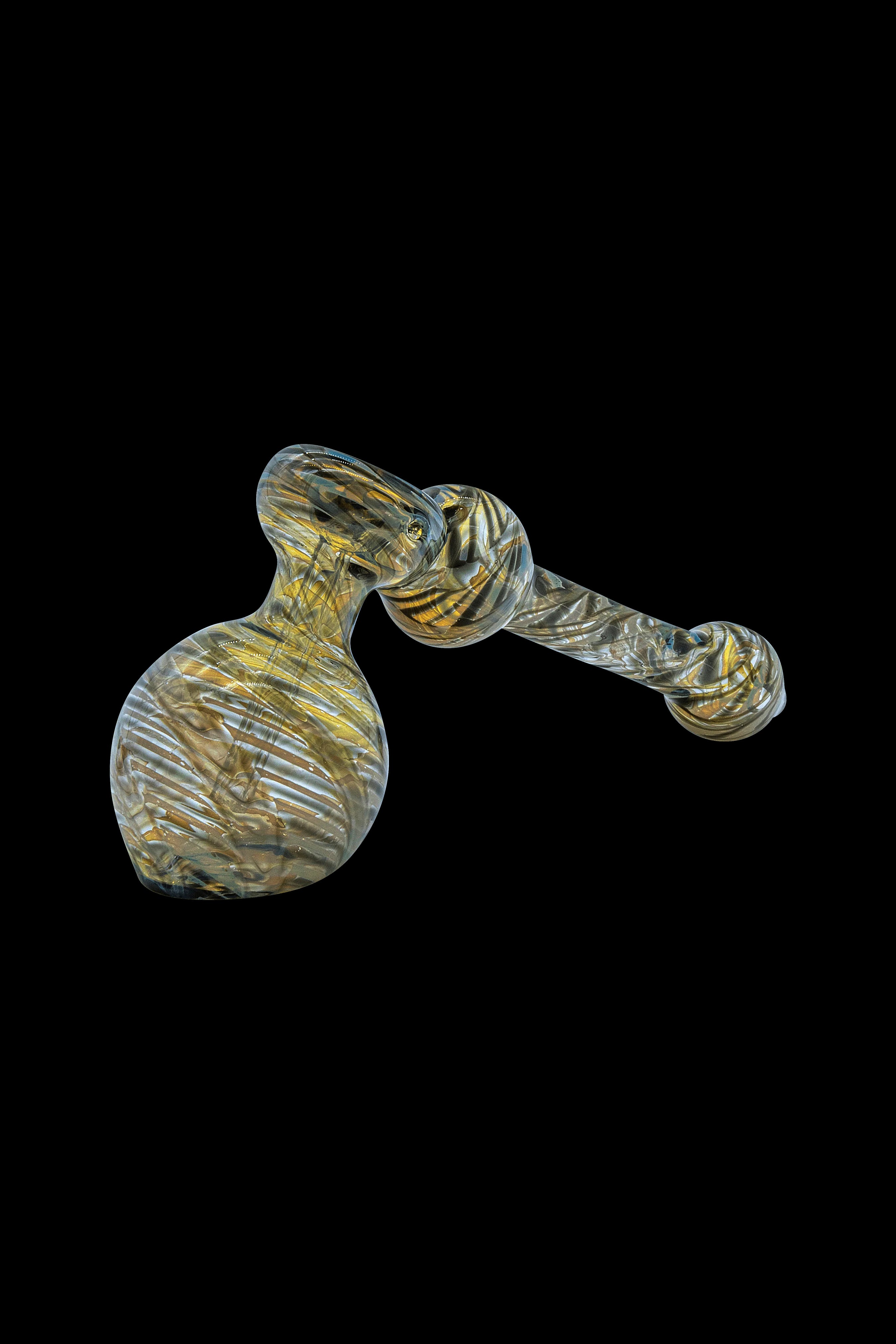 A glass bubbler pipe with a swirled gold and brown pattern, isolated on a black background.