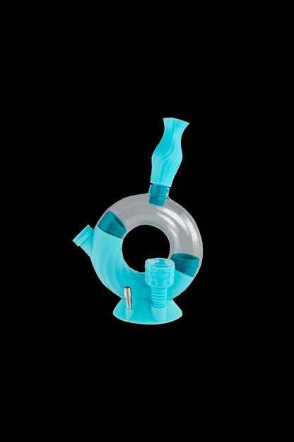 Blue glass water pipe for cannabis smoking.