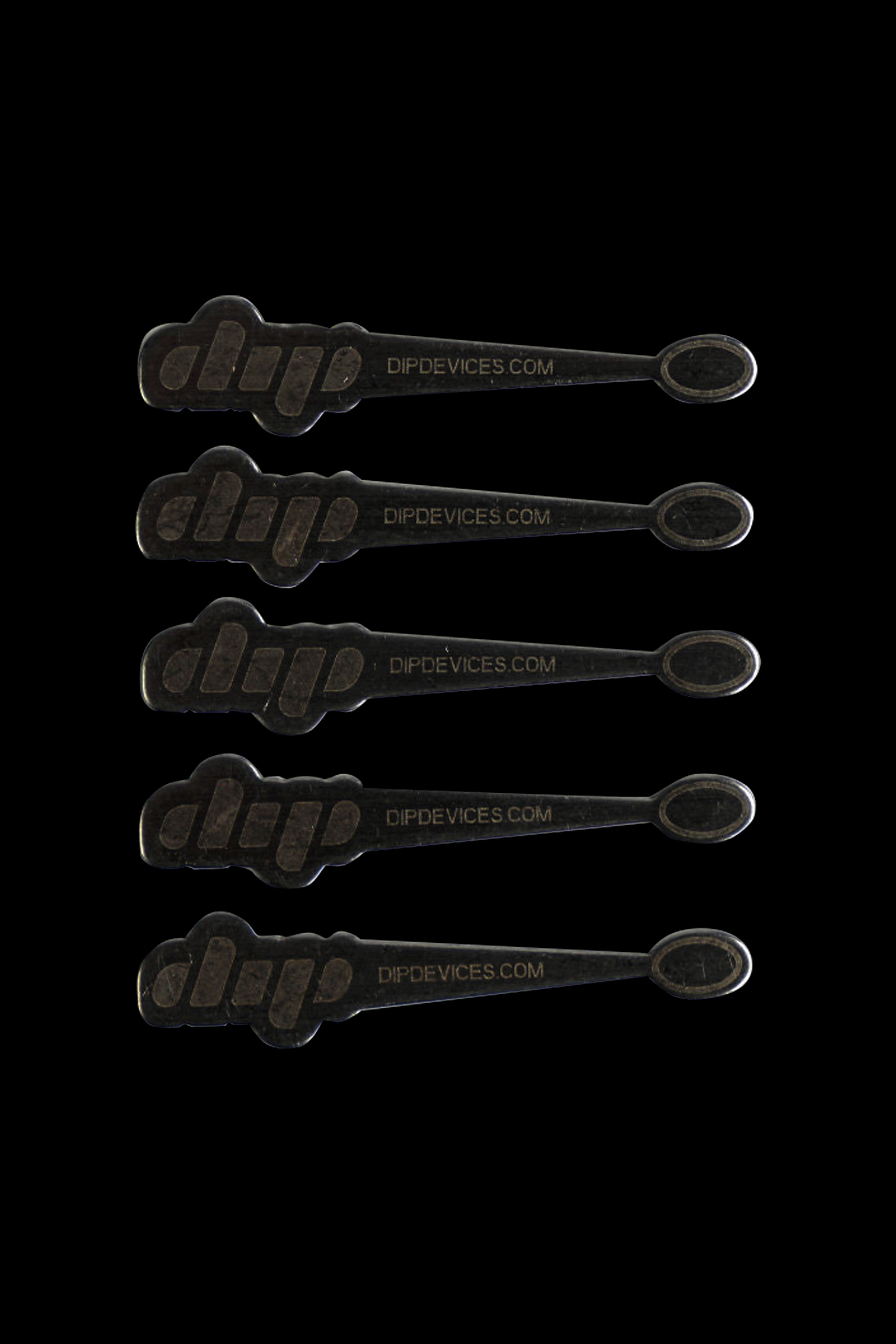 Five cannabis dab tools with the brand “DipDevices.com” laid flat on a black background.