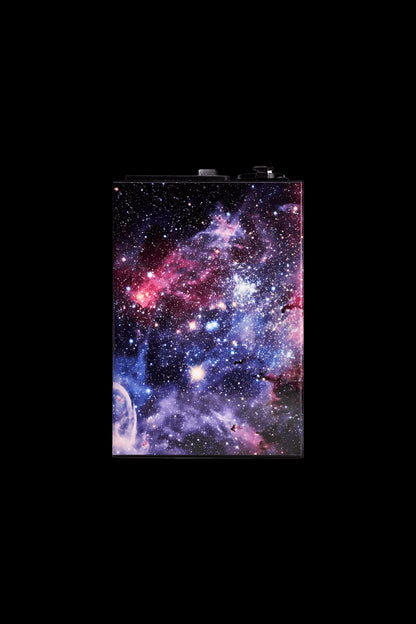 Nebula-patterned rolling tray with cannabis accessories.