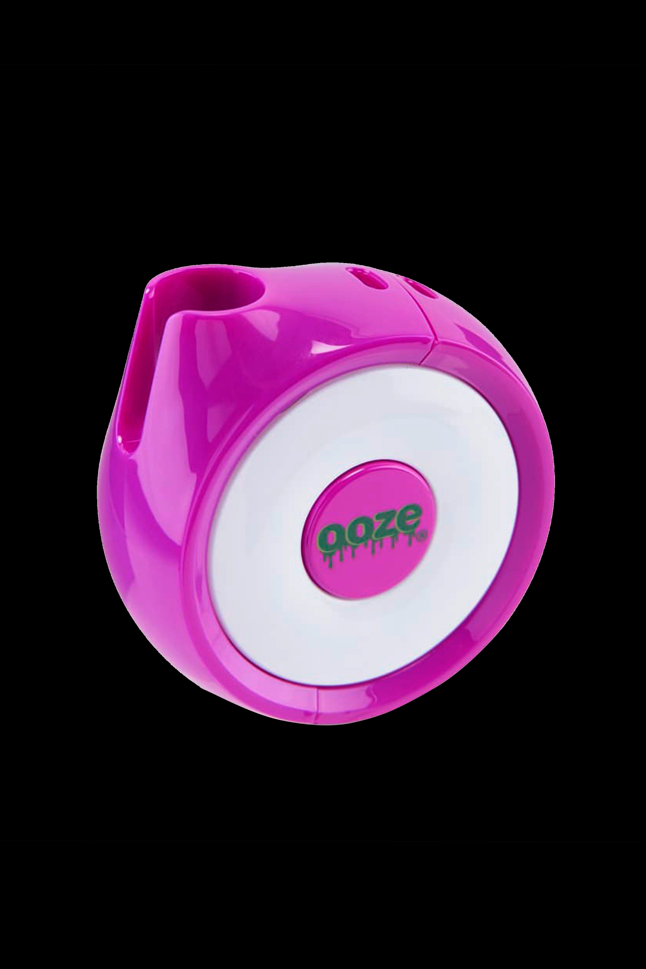 Pink cannabis smoking device with “ooze” logo.