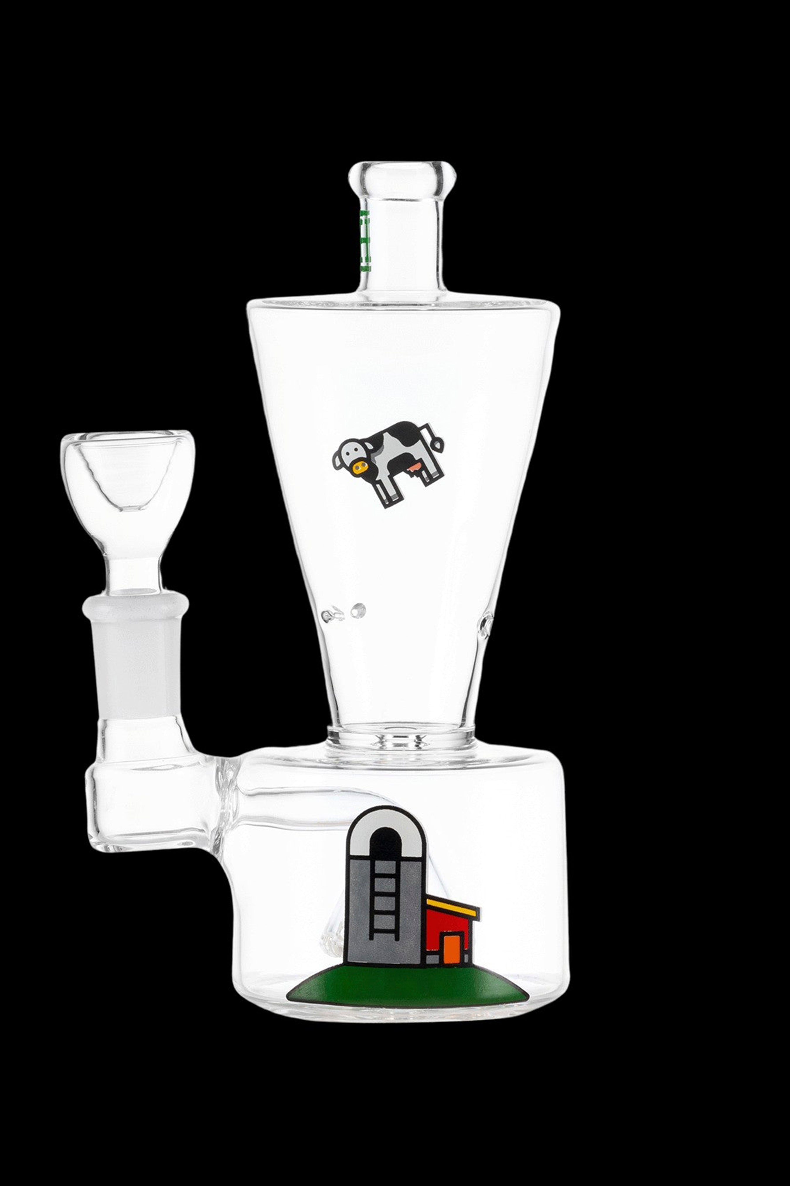 Clear glass water pipe decorated with a farm scene including a barn, fence, and cow.