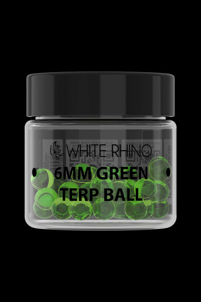 A jar of green cannabis terp balls labeled "White Rhino 6mm Terp Ball."
