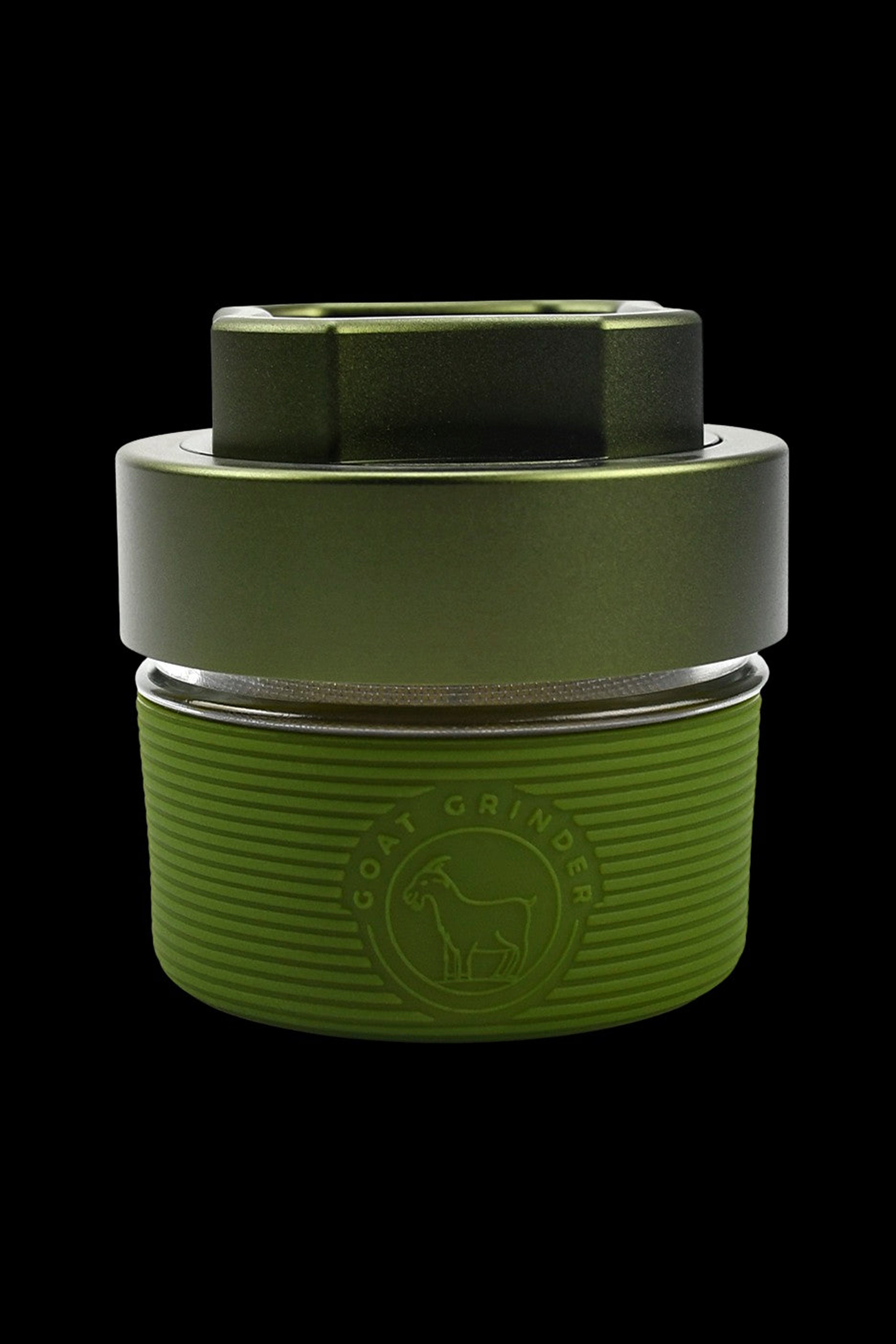 Olive green cannabis grinder with a goat logo.