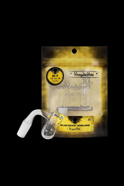 A glass cannabis water pipe, labeled “Splash Bucket Whirlwind” by Honeybee Herbs, sealed in a clear plastic bag.