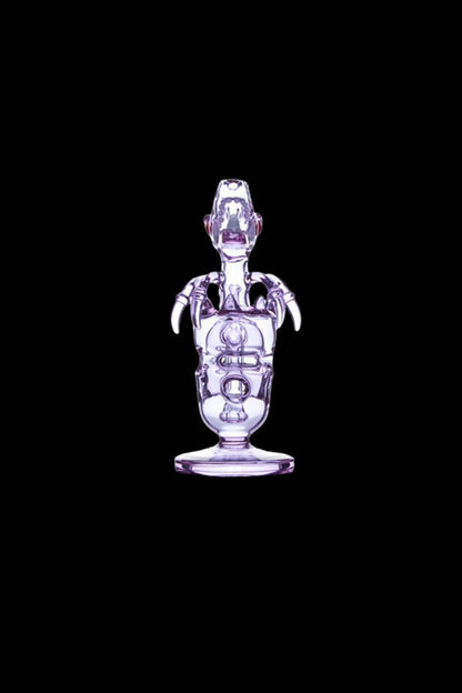 Center-frontal view of the purple Calibear Fab Dino Rig on a black background, showing its dinosaur-shaped glass body and claw-like arms.