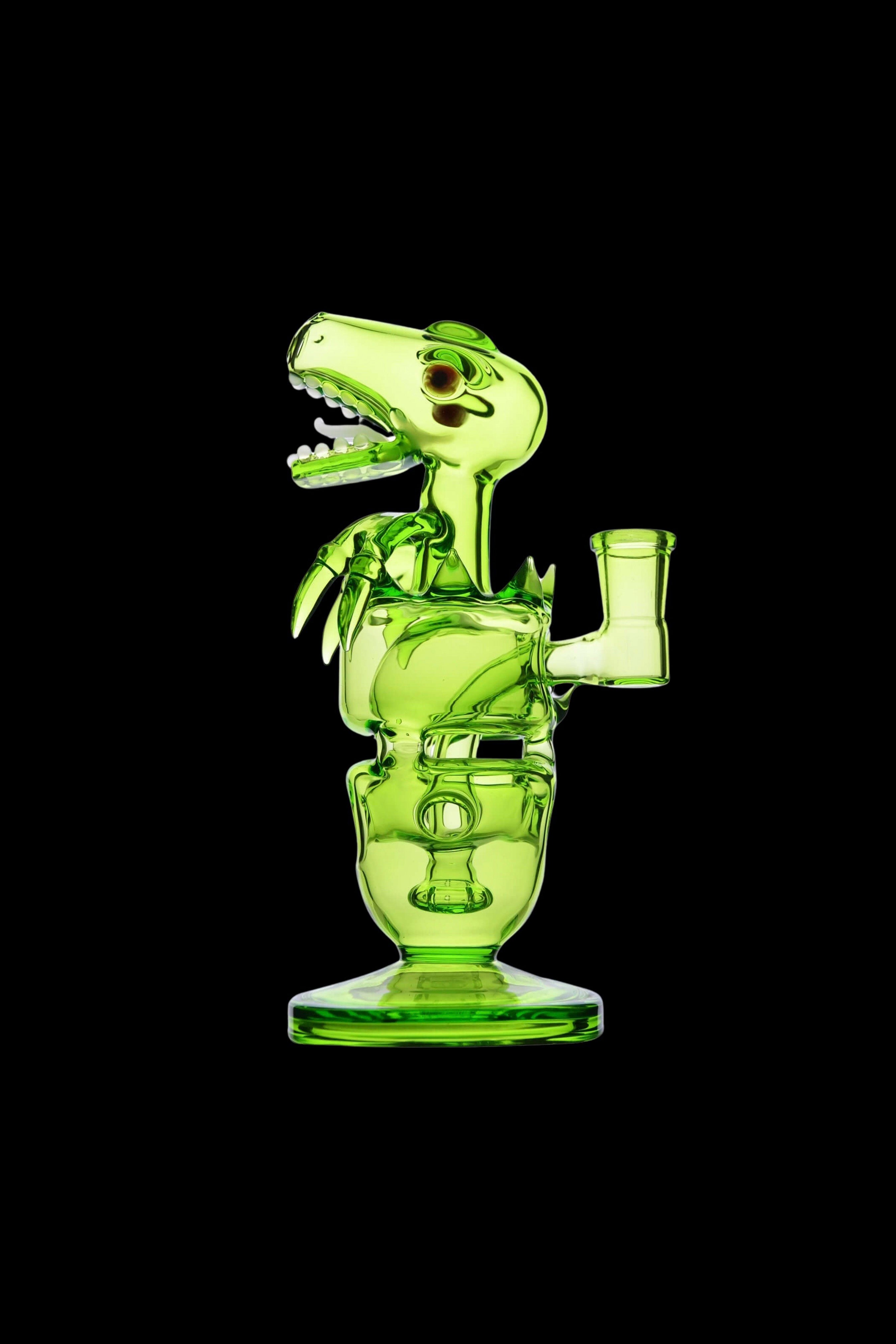Side profile of the lime-green Calibear Fab Dino Rig against a black background, highlighting its open toothed mouth and clawed arms.
