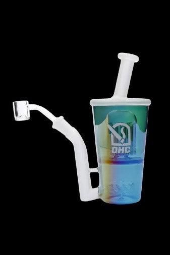 Glass dab rig resembling a beverage cup with detached downstem and quartz banger.